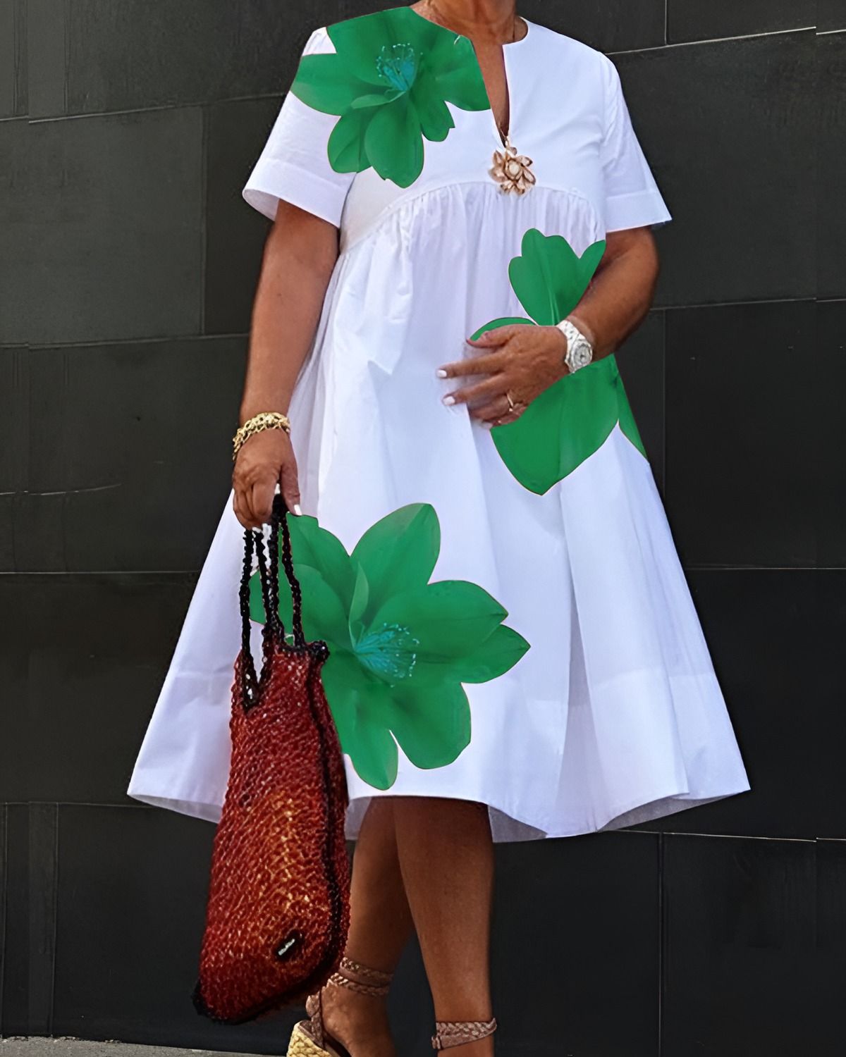 Crisp white midi dress with bold green florals